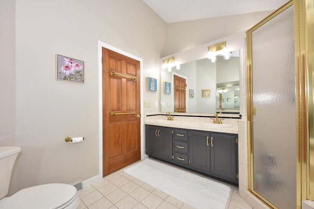 bathroom featuring walk in shower, tile patterned floors, toilet, vaulted ceiling, and vanity