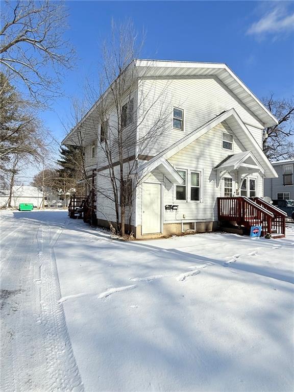 view of snow covered property