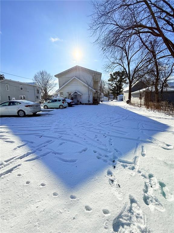 view of yard layered in snow