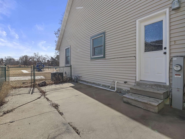 view of side of home with a patio area