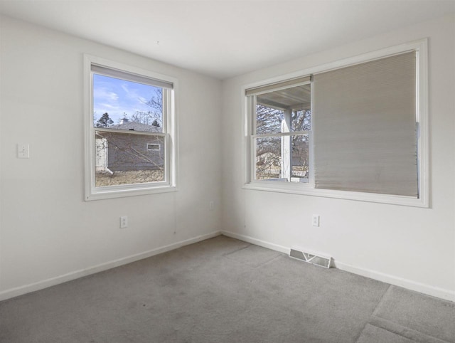 view of carpeted spare room