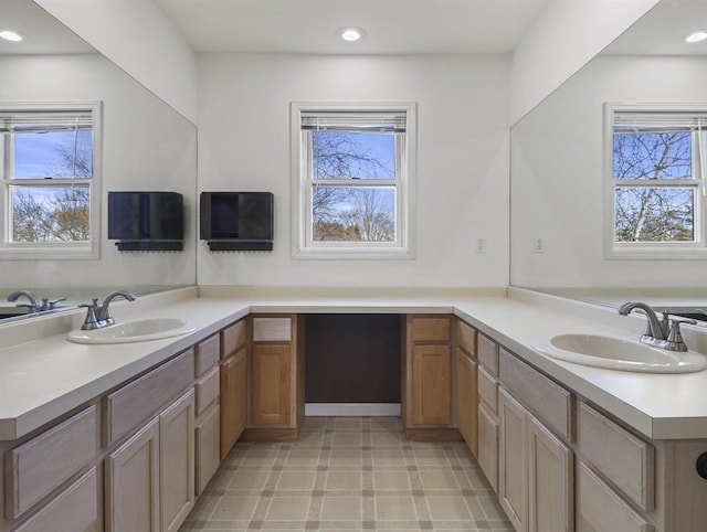 kitchen featuring a healthy amount of sunlight and sink