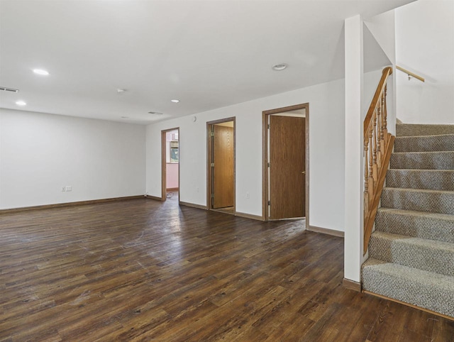 empty room featuring dark hardwood / wood-style floors