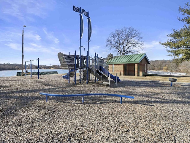 view of play area with a water view