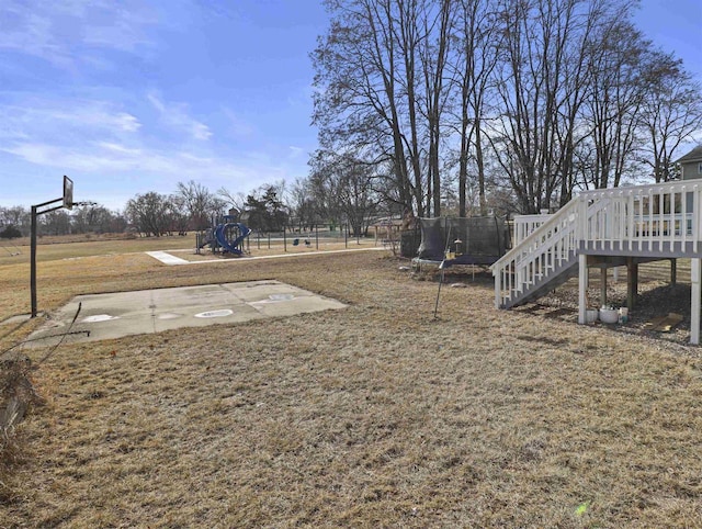 view of yard featuring a trampoline