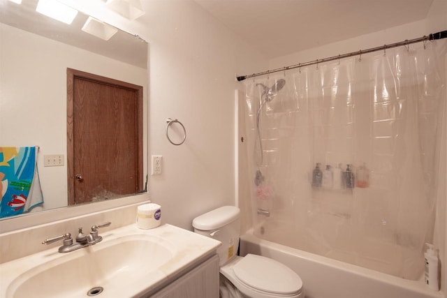 full bathroom featuring vanity, toilet, and shower / bath combo with shower curtain