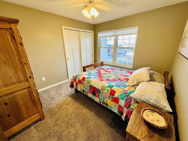 bedroom with ceiling fan, a closet, and light carpet