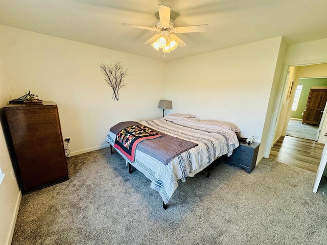 bedroom featuring ceiling fan and carpet floors