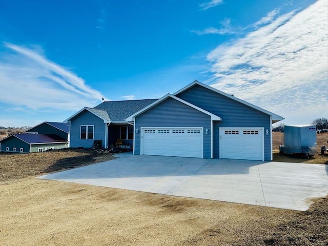 ranch-style home with a garage