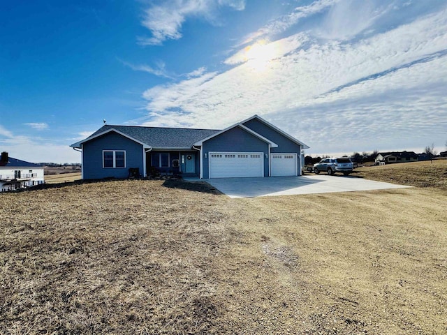 single story home with a garage and a front yard