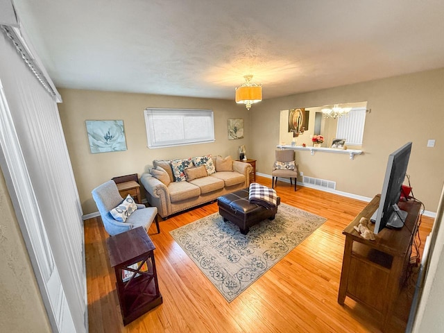 living room with hardwood / wood-style floors