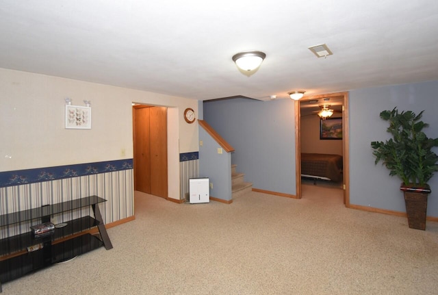 unfurnished room featuring carpet