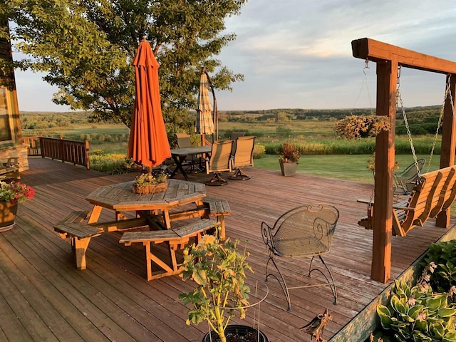 deck featuring outdoor dining space