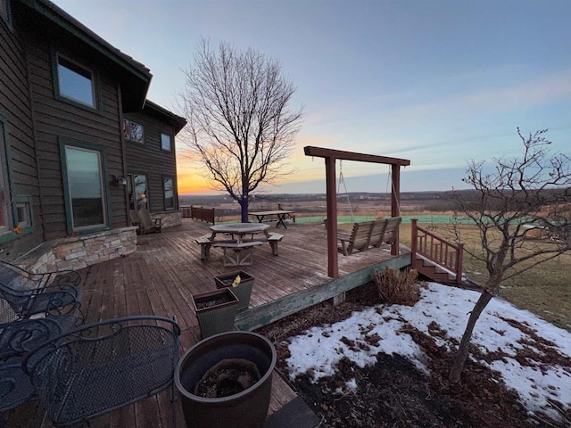 view of snow covered deck