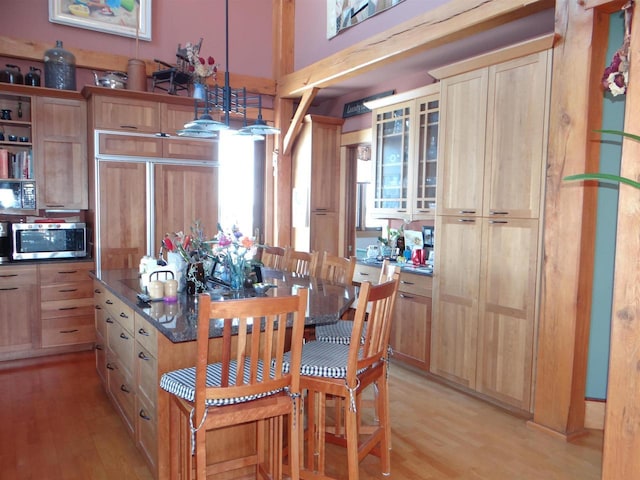 dining area with light wood finished floors