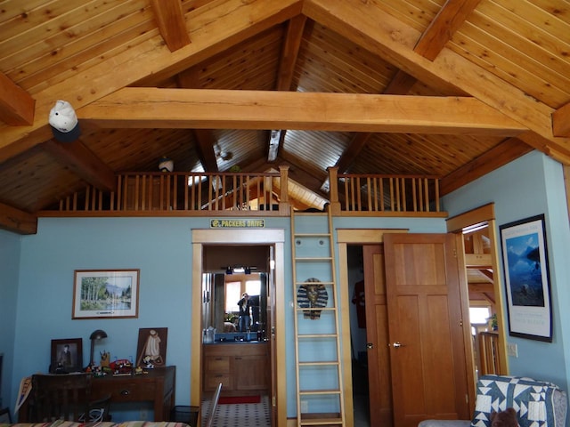 interior space featuring vaulted ceiling with beams and wood ceiling