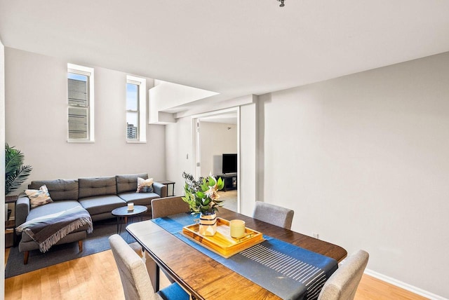 dining space featuring hardwood / wood-style flooring