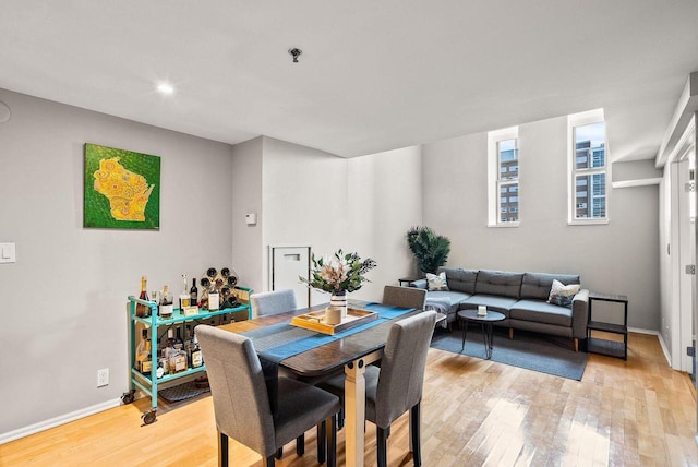 dining room with light hardwood / wood-style floors