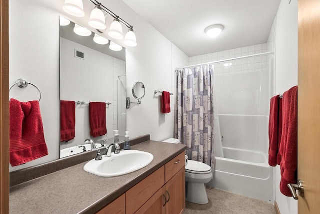 E4725 Riverside Dr, Spring Green, WI 53588 - full bathroom with vanity, toilet, shower / tub combo with curtain, and tile patterned flooring