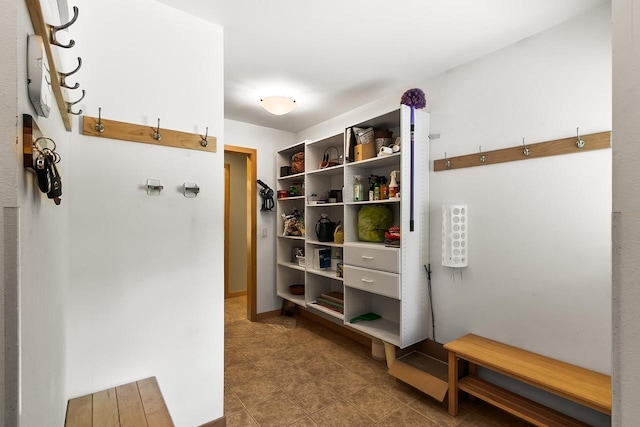 E4725 Riverside Dr, Spring Green, WI 53588 - mudroom featuring tile patterned floors and baseboards