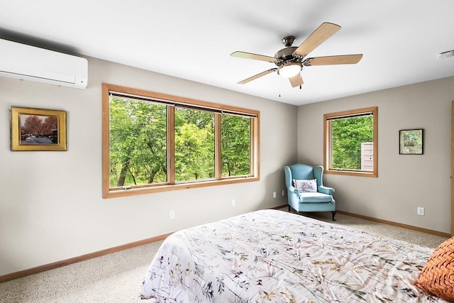 E4725 Riverside Dr, Spring Green, WI 53588 - carpeted bedroom with multiple windows, a wall unit AC, baseboards, and a ceiling fan