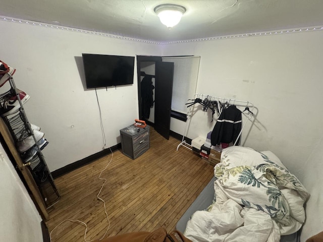 bedroom featuring hardwood / wood-style flooring