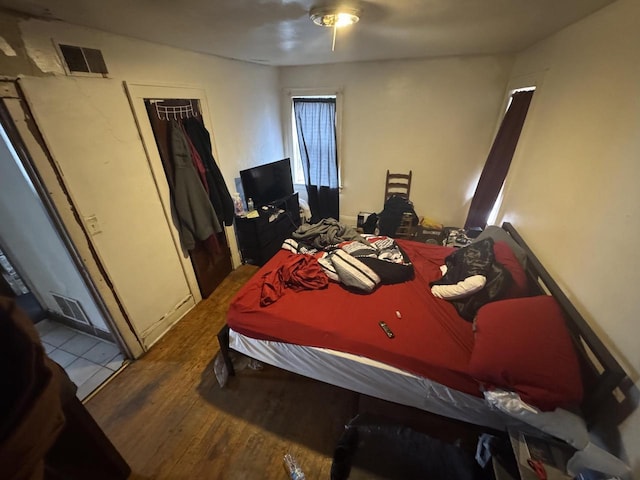 bedroom featuring hardwood / wood-style flooring