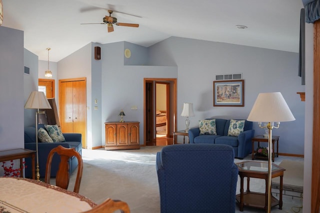 carpeted living room featuring lofted ceiling and ceiling fan