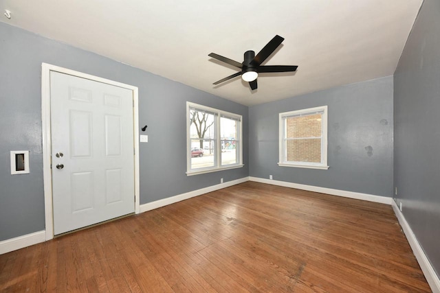 entrance foyer with hardwood / wood-style flooring and ceiling fan