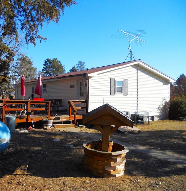 rear view of house with a deck