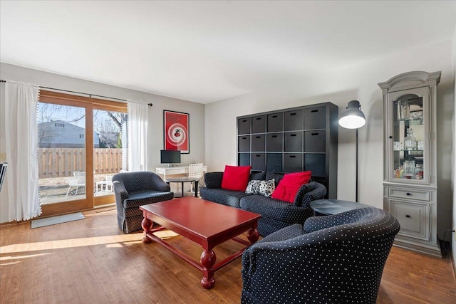 living room with wood finished floors