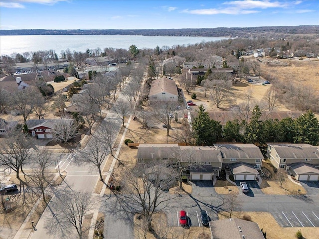 aerial view with a water view and a residential view