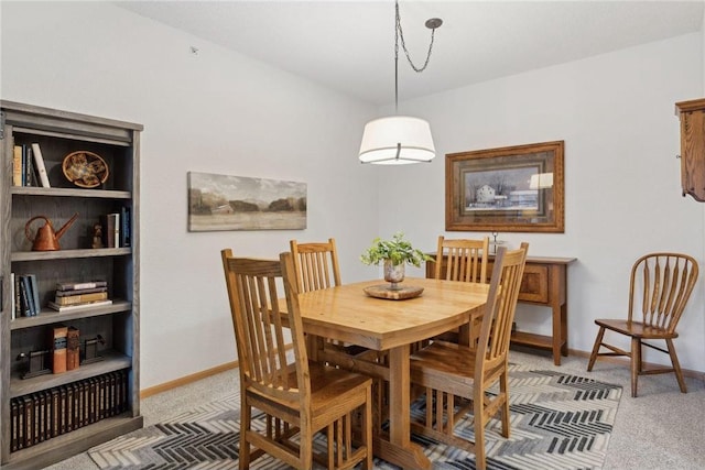 dining area with carpet