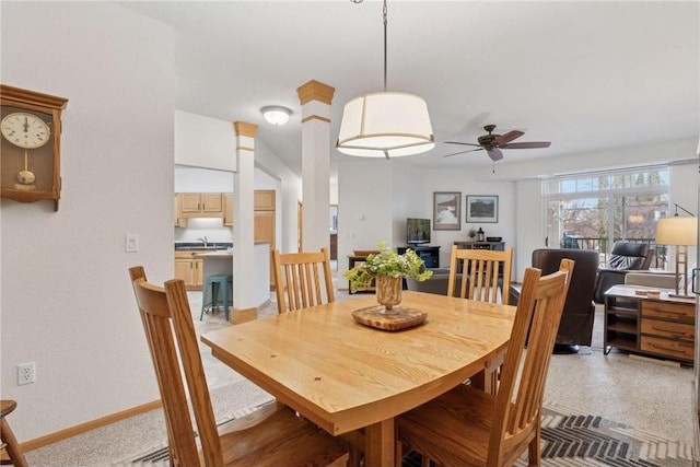 dining space featuring ceiling fan