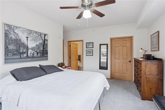 bedroom with light colored carpet and ceiling fan