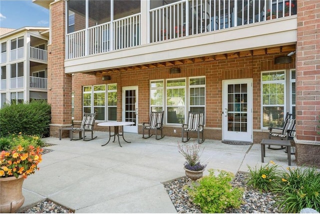 view of patio / terrace with a balcony