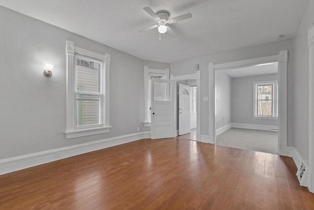 empty room featuring light hardwood / wood-style floors and ceiling fan