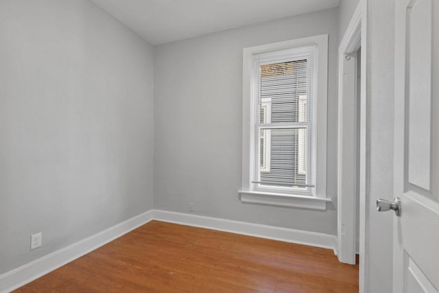 unfurnished room featuring light hardwood / wood-style floors