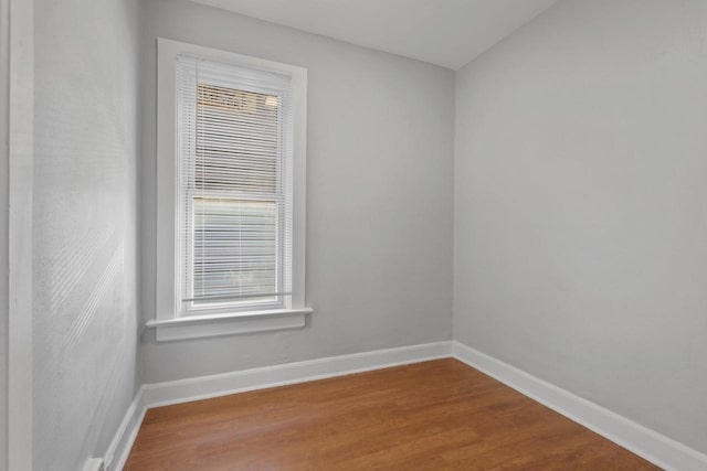 spare room featuring hardwood / wood-style flooring