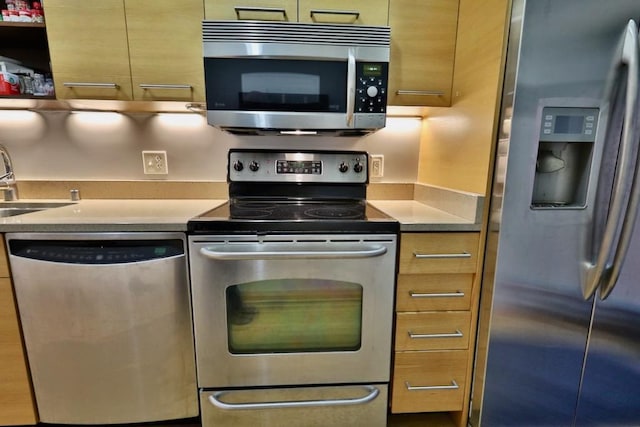 kitchen with stainless steel appliances and sink