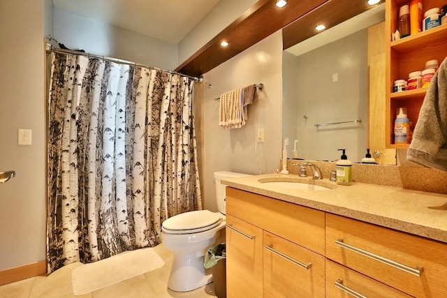 bathroom with tile patterned flooring, vanity, a shower with shower curtain, and toilet