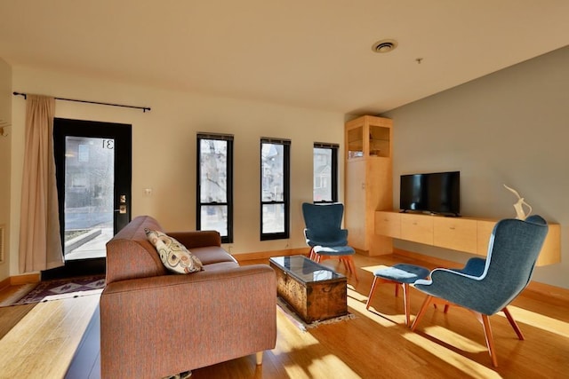 living room with light wood-type flooring