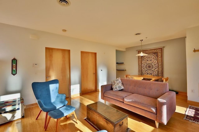 living room with light wood-type flooring