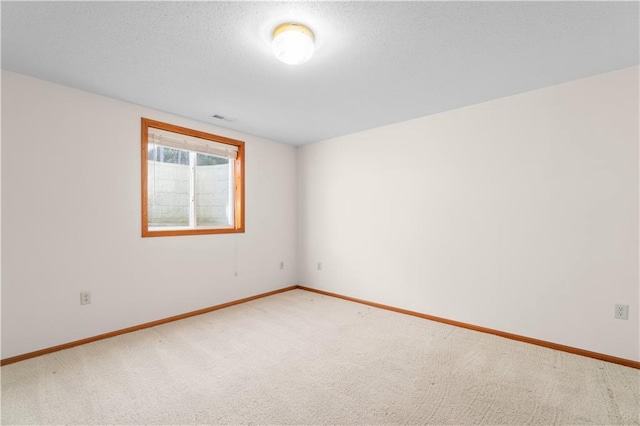 unfurnished room with carpet