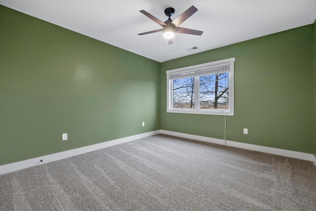 unfurnished room with carpet floors and ceiling fan