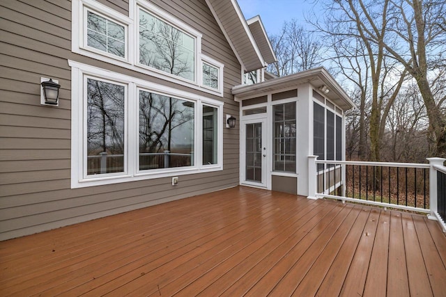 wooden terrace with a sunroom