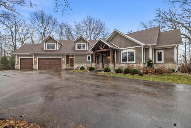 craftsman-style house featuring a garage