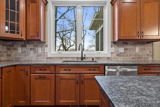 kitchen with sink, backsplash, a wealth of natural light, and stainless steel dishwasher