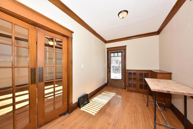 office featuring crown molding and light hardwood / wood-style floors