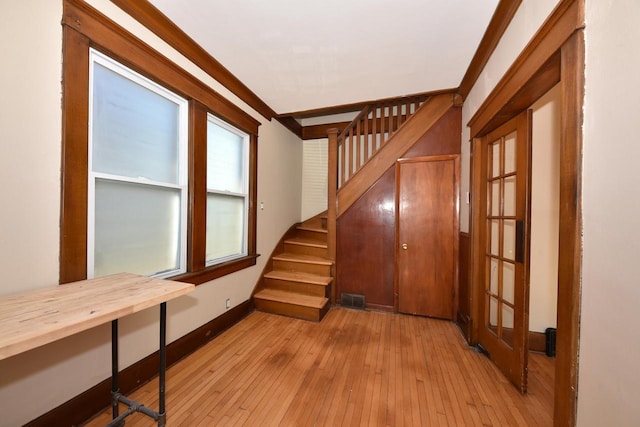 staircase featuring hardwood / wood-style flooring